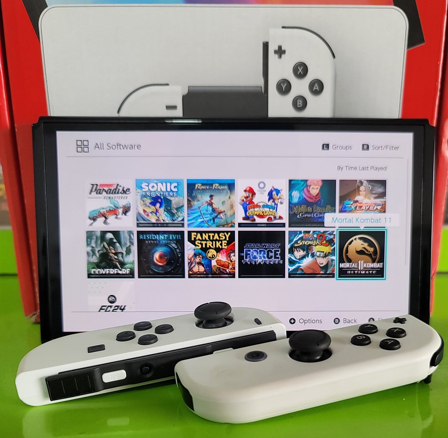 Brand New Nintendo Switch OLED + 10 Installed Games